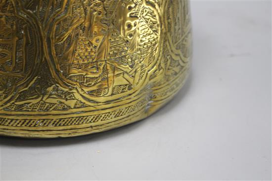 A Cairoware brass jardiniere, decorated with panels of figures and calligraphy, height 18cm, diameter 24cm